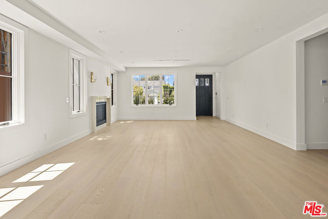 Empty room, Fireplace, Interior, Recessed Lighting, Wood Texture Flooring