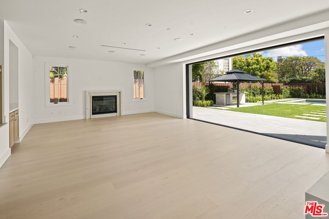 Empty room, Fireplace, Interior, Recessed Lighting, Wood Texture Flooring