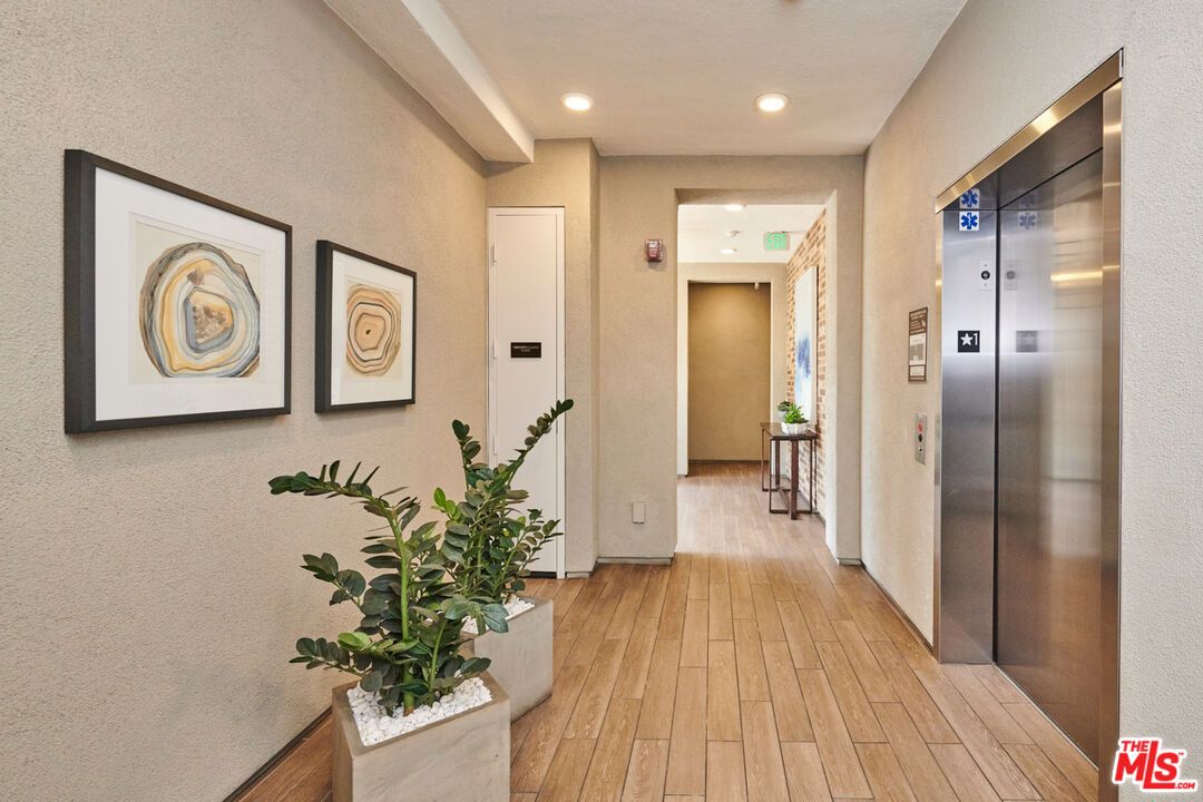 Elevator, Interior, Recessed Lighting, Wood Texture Flooring