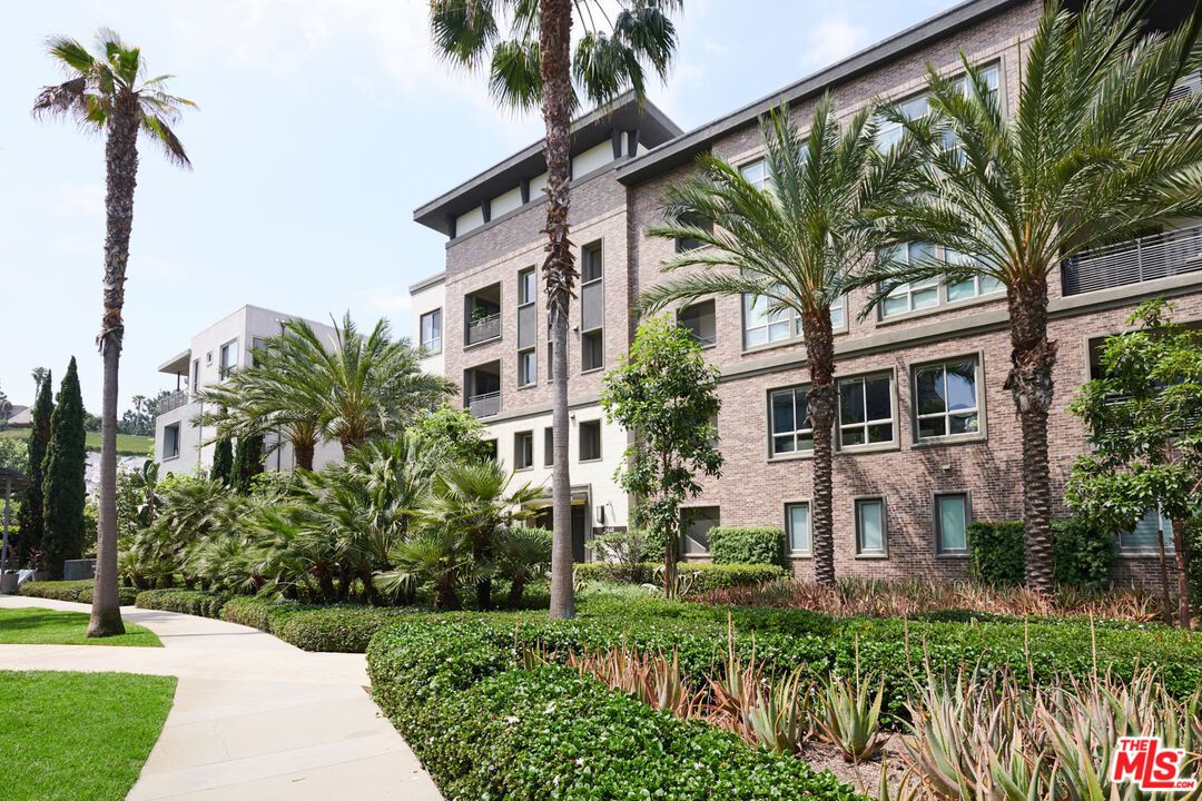 Exterior, Facade, Brick Facade, Condo Building