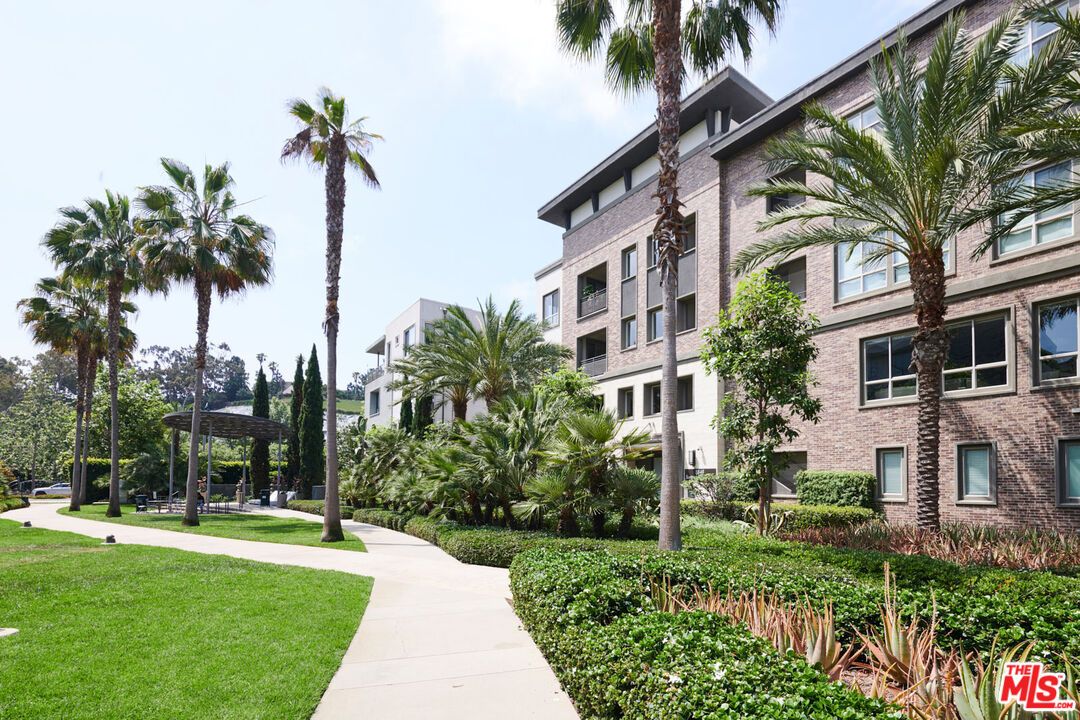 Exterior, Facade, Brick Facade, Condo Building