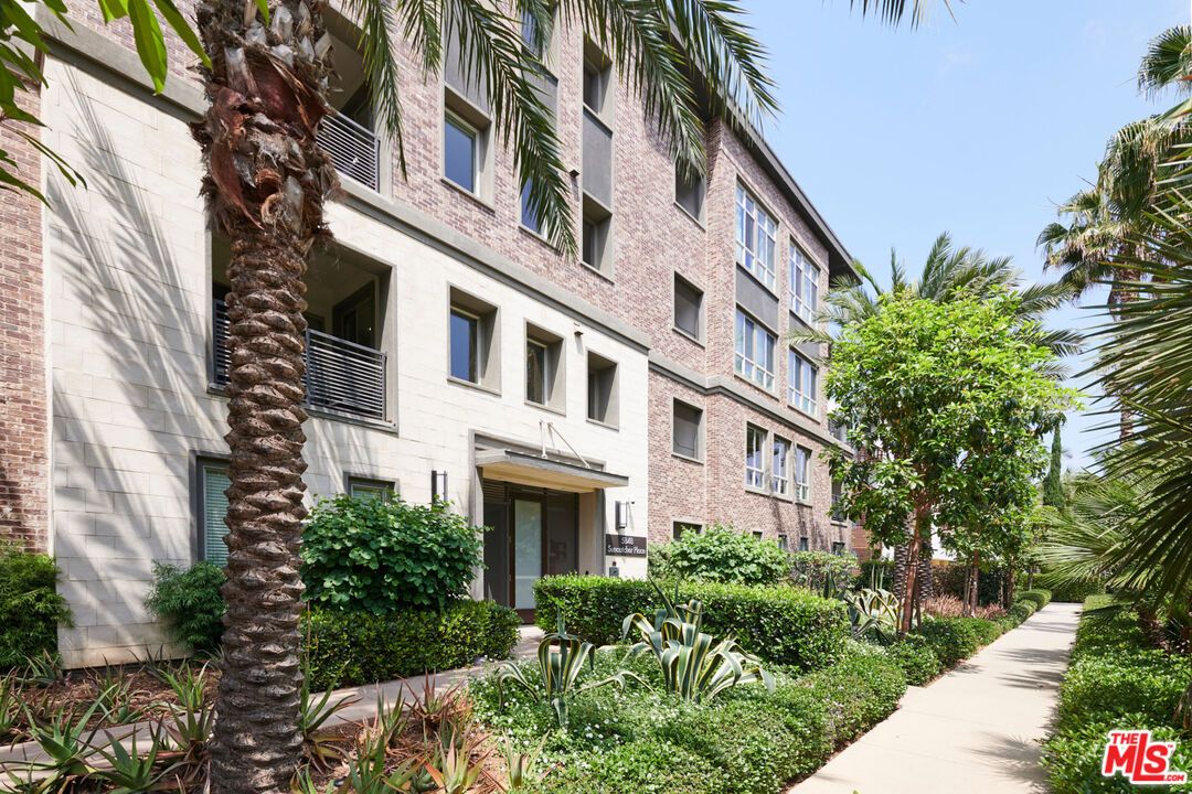 Exterior, Facade, Brick Facade, Condo Building