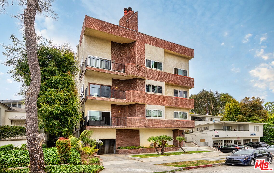 Exterior, Facade, Brick Facade, Condo Building