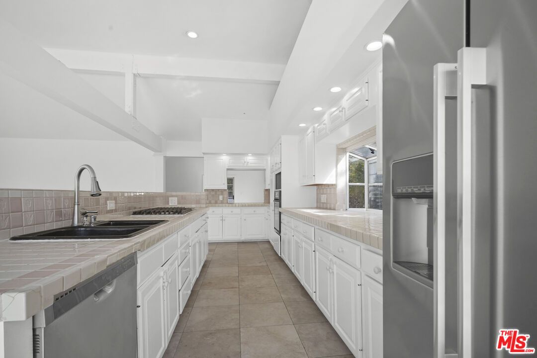 Interior, Kitchen, Recessed Lighting, Stainless Steel Appliances, Tile Countertops