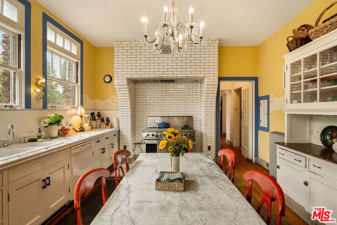 Chandelier, Dining room, Interior, Kitchen, Stainless Steel Appliances, Stone Walls, Wood Texture Flooring