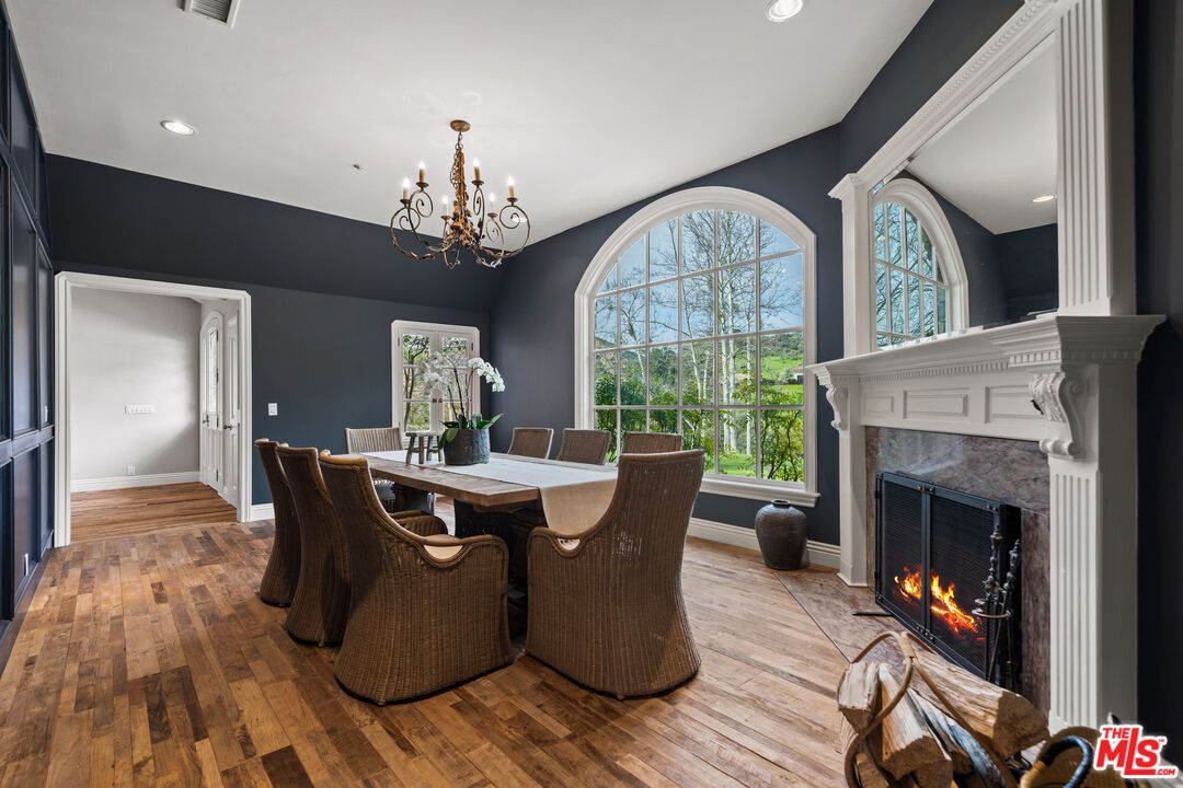 Chandelier, Dining room, Fireplace, Interior, Recessed Lighting, Wood Texture Flooring