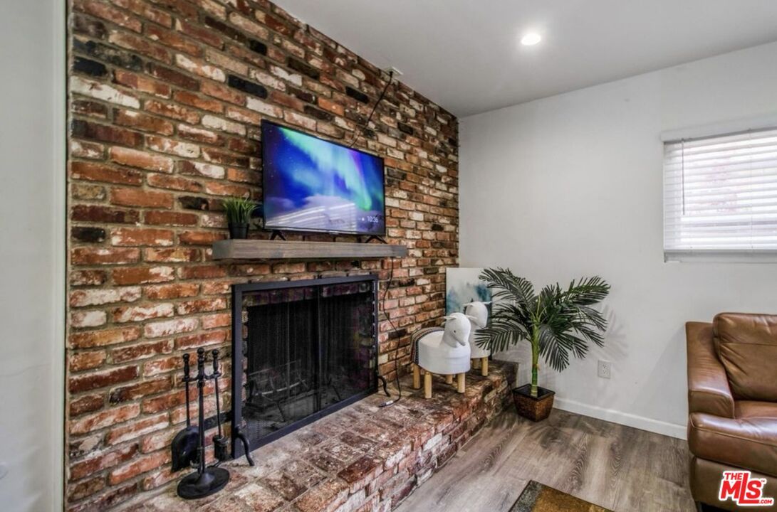 Fireplace, Interior, Recessed Lighting, Stone Walls, Wood Texture Flooring