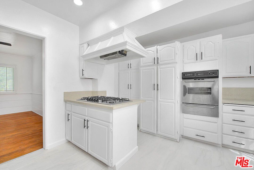 Interior, Kitchen, Marble, Recessed Lighting, Stainless Steel Appliances, Wood Texture Flooring