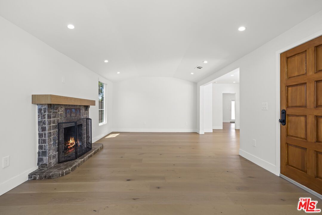 Empty room, Fireplace, Interior, Recessed Lighting, Wood Texture Flooring