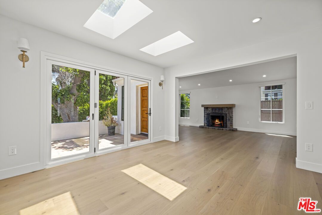 Empty room, Fireplace, Interior, Recessed Lighting, Wood Texture Flooring