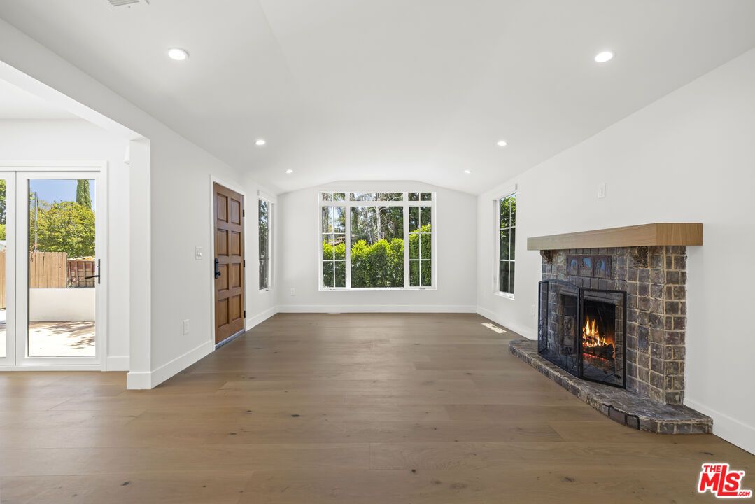 Empty room, Fireplace, Interior, Recessed Lighting, Wood Texture Flooring
