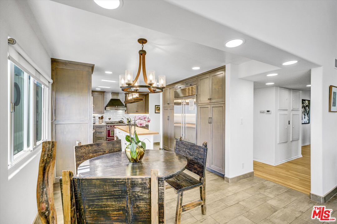 Dining room, Interior, Kitchen, Pendant Lights, Recessed Lighting, Stainless Steel Appliances, Wood Texture Flooring