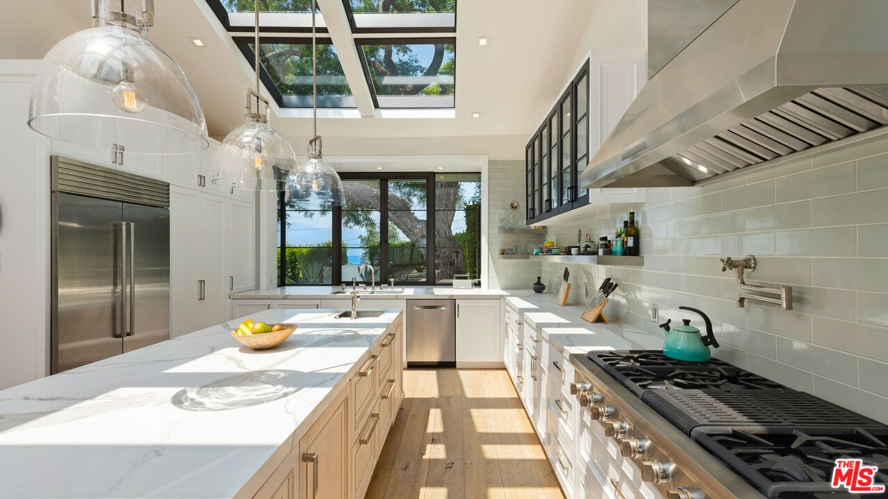 Glass Ceilings, Interior, Kitchen, Pendant Lights, Recessed Lighting, Stainless Steel Appliances, Wood Texture Flooring