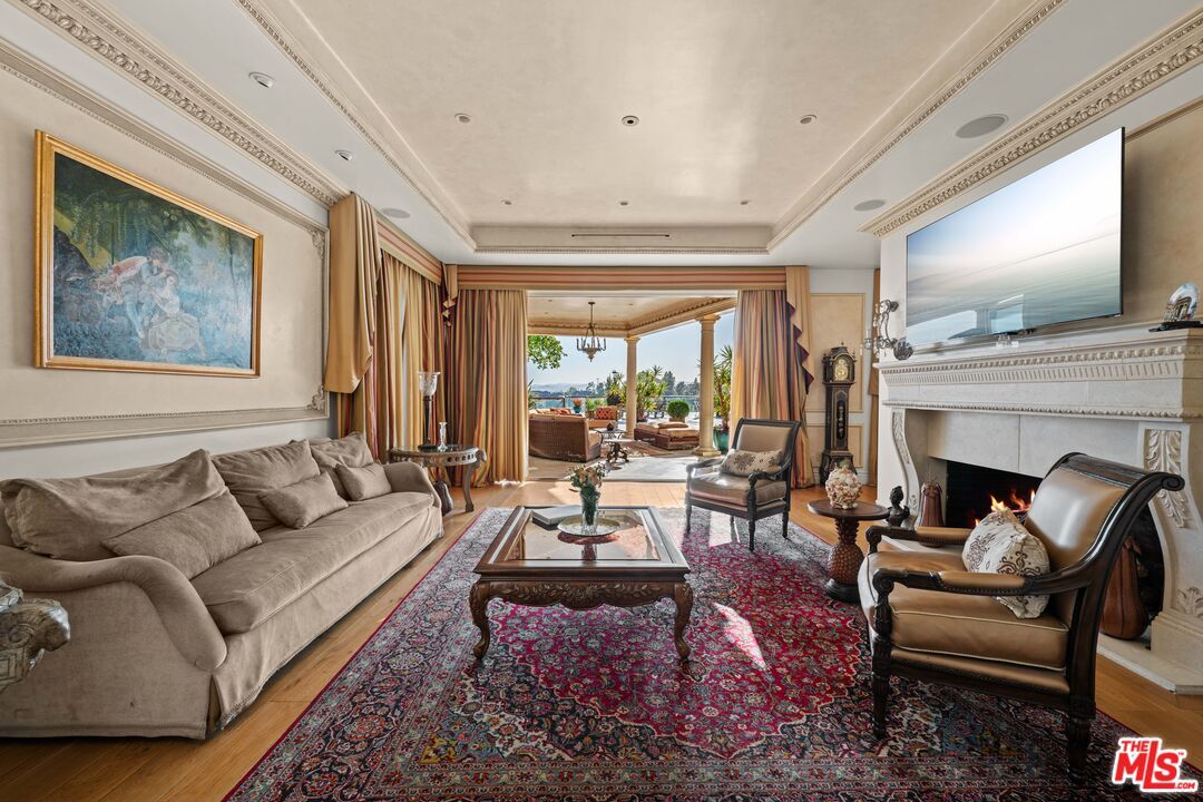 Chandelier, Dining room, Fireplace, Interior, Living room, Recessed Lighting, Wood Texture Flooring