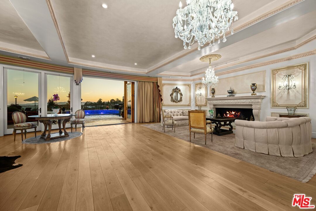 Chandelier, Dining room, Fireplace, Interior, Living room, Recessed Lighting, Wood Texture Flooring