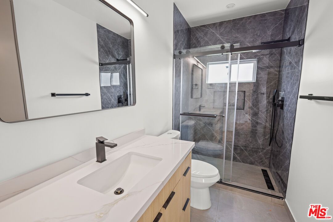 Bathroom, Dual Sink Vanities, Glass Shower, Interior, Marble Walls