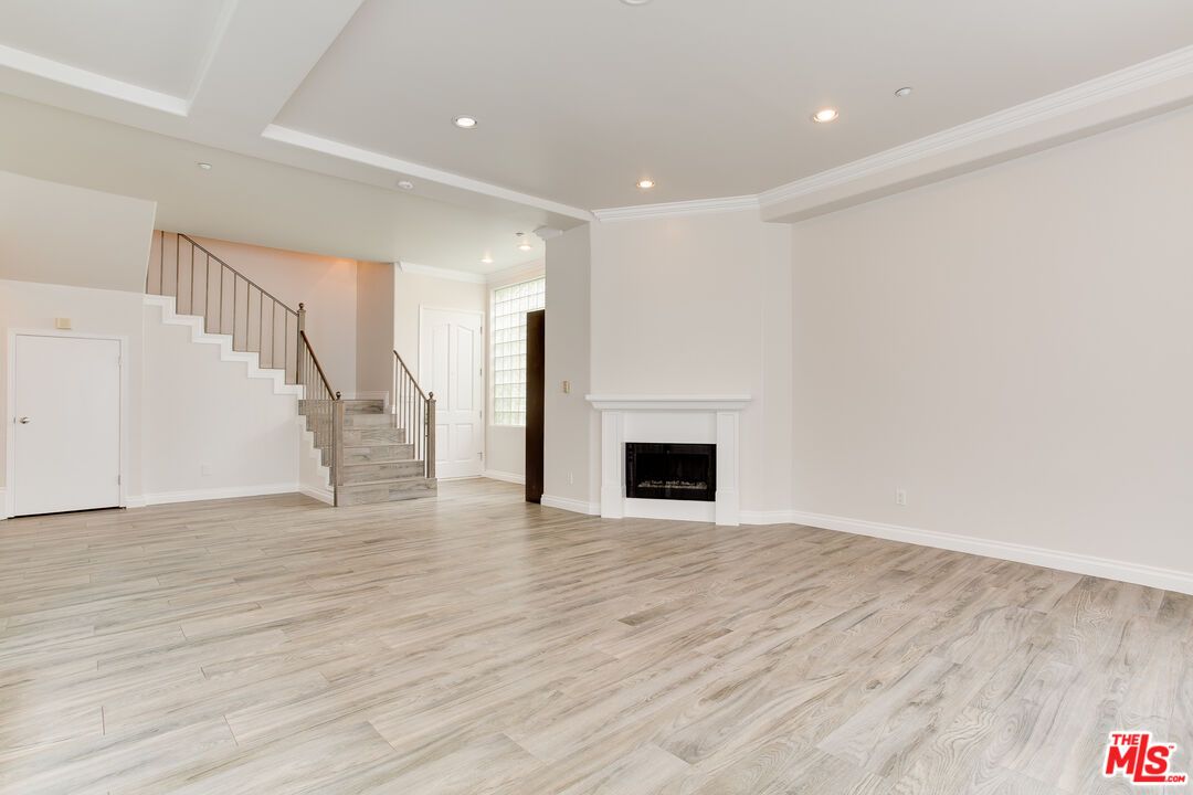 Empty room, Fireplace, Interior, Recessed Lighting, Wood Texture Flooring