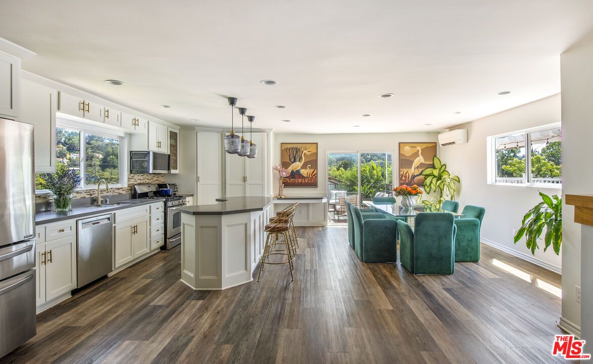 Dining room, Interior, Kitchen, Pendant Lights, Recessed Lighting, Stainless Steel Appliances, Wood Texture Flooring
