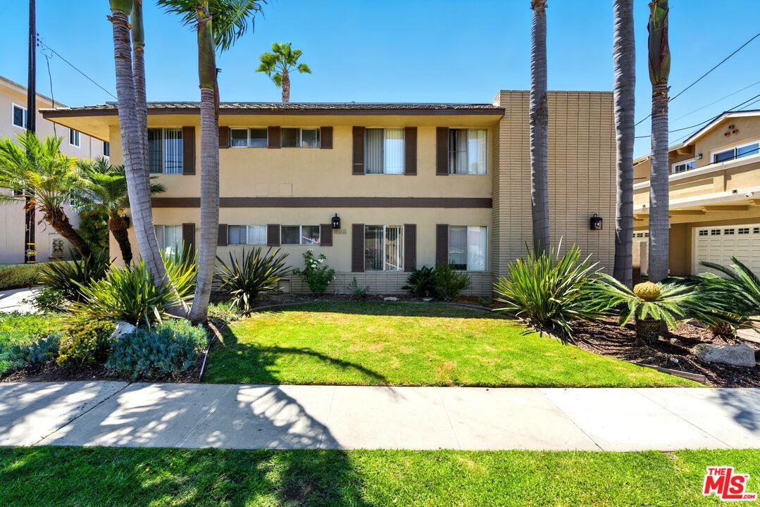 Attached, Backyard, Exterior, Facade, Brick Facade, Mediterranean
