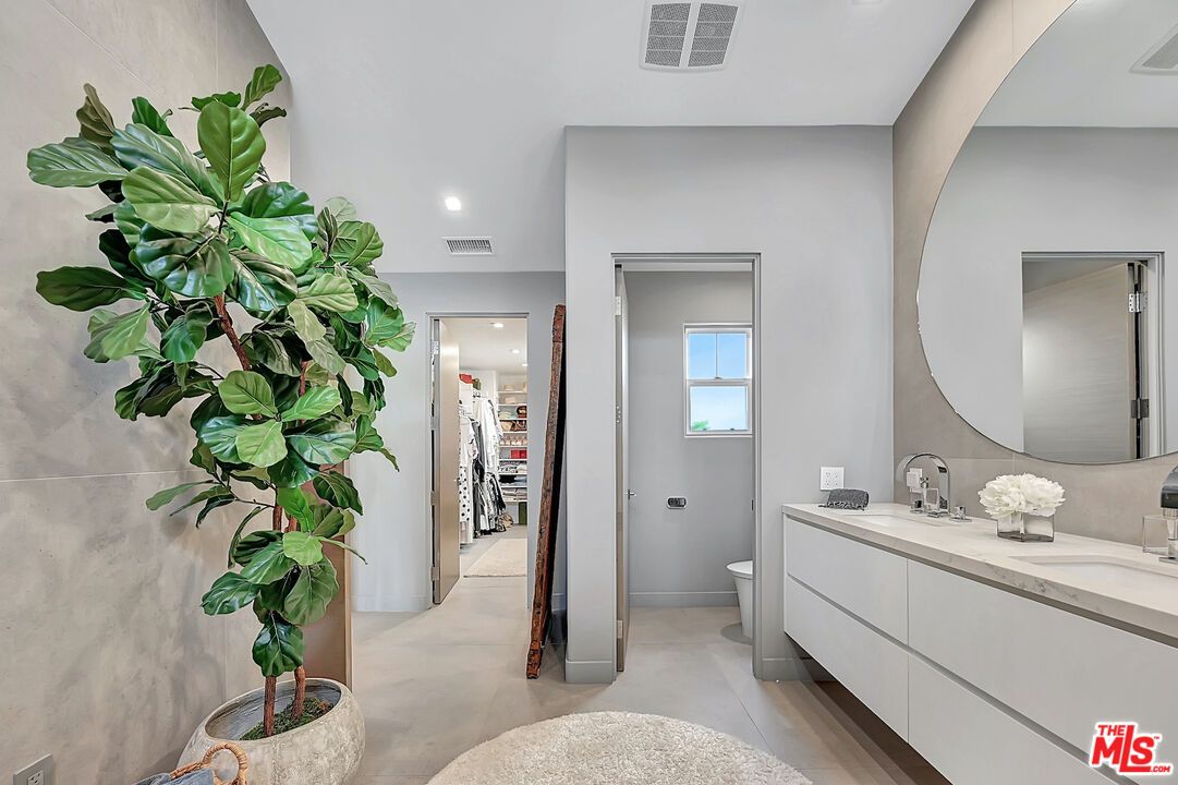 Bathroom, Dual Sink Vanities, Interior, Recessed Lighting, Walk-in Closets