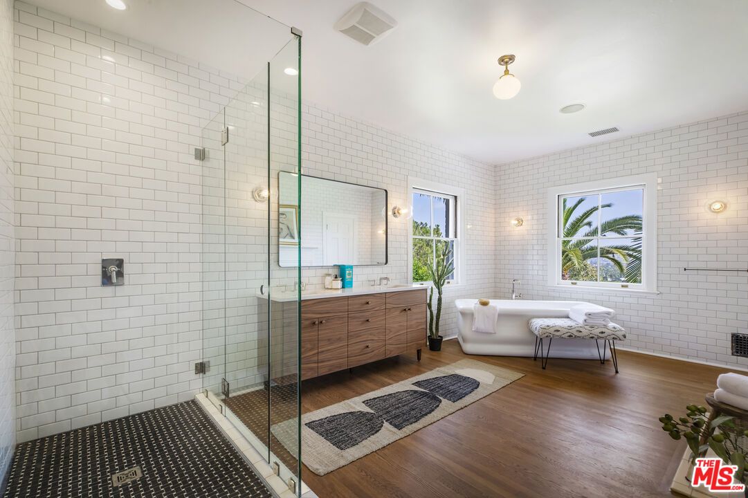 Bathroom, Dual Sink Vanities, Free Standing Baths, Glass Shower, Interior, Recessed Lighting, Wood Texture Flooring