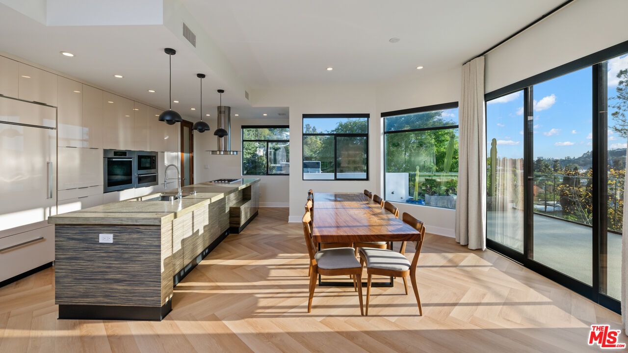 Dining room, Interior, Kitchen, Pendant Lights, Recessed Lighting, Stainless Steel Appliances, Wood Texture Flooring
