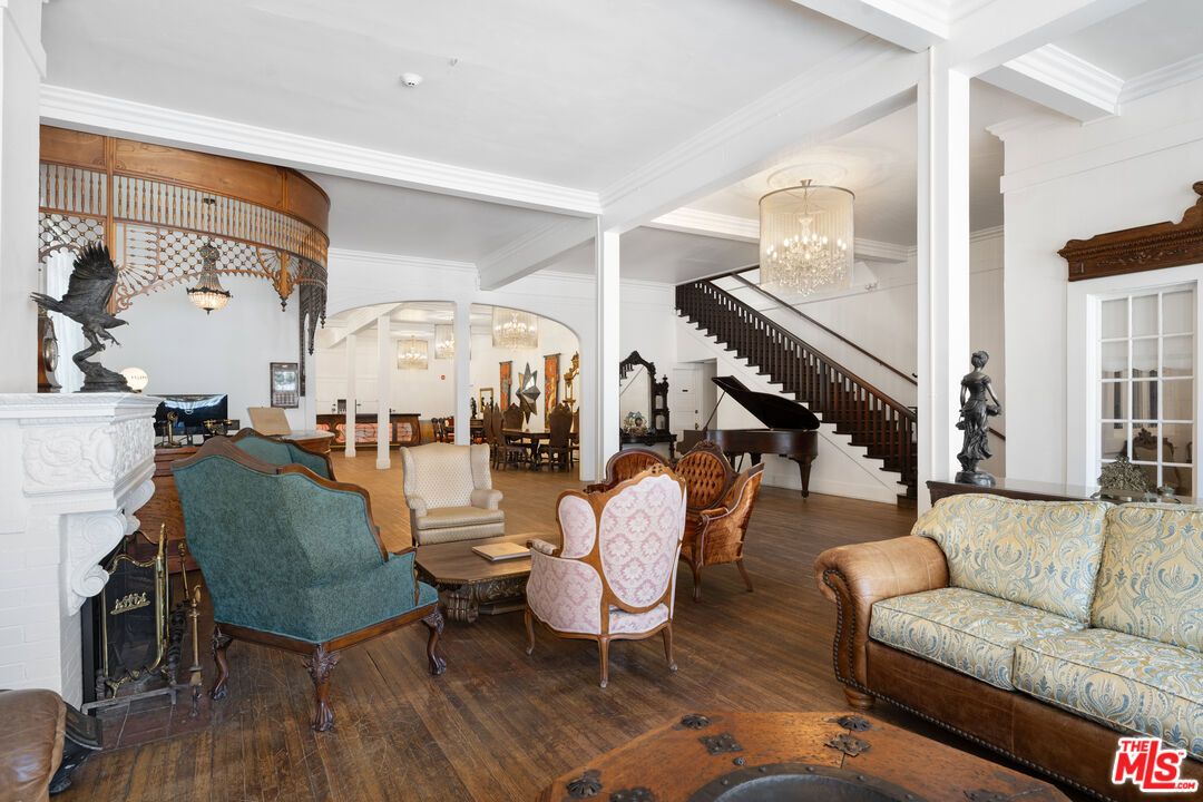 Chandelier, Fireplace, Interior, Living room, Pendant Lights, Piano, Wood Texture Flooring