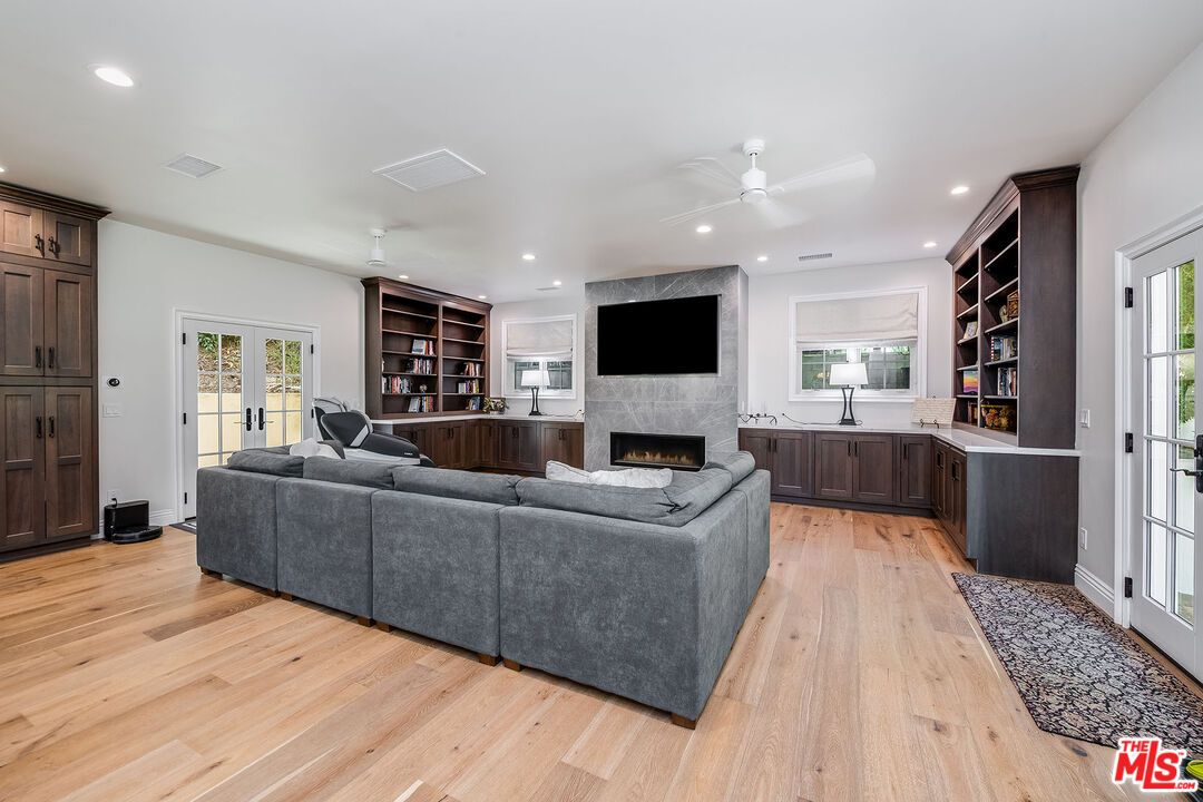 Fireplace, Interior, Living room, Recessed Lighting, Wood Texture Flooring