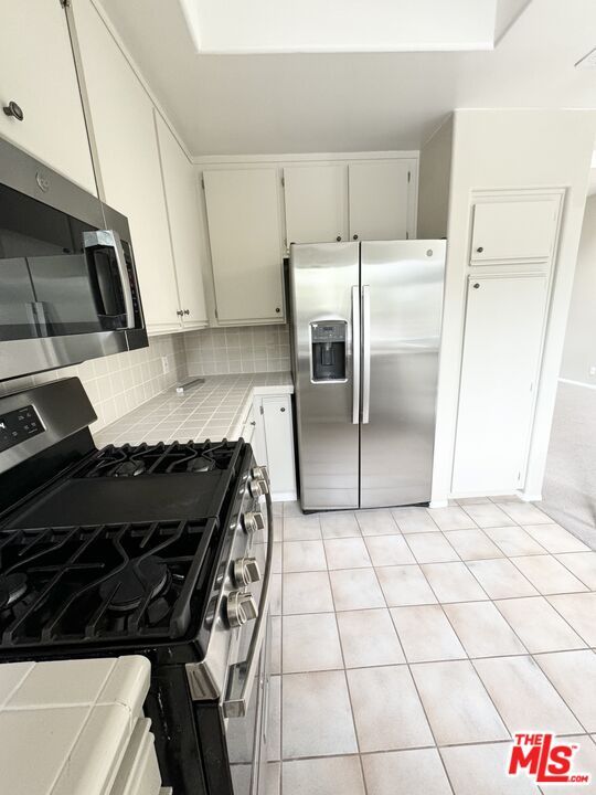 Interior, Kitchen, Stainless Steel Appliances, Tile Countertops