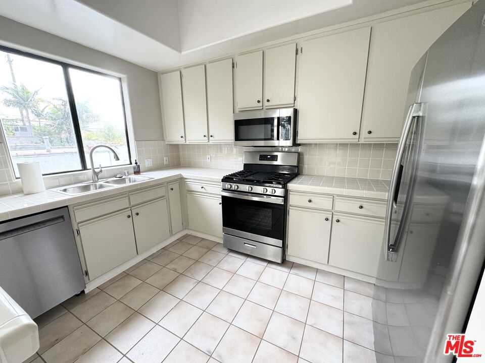 Interior, Kitchen, Stainless Steel Appliances, Tile Countertops