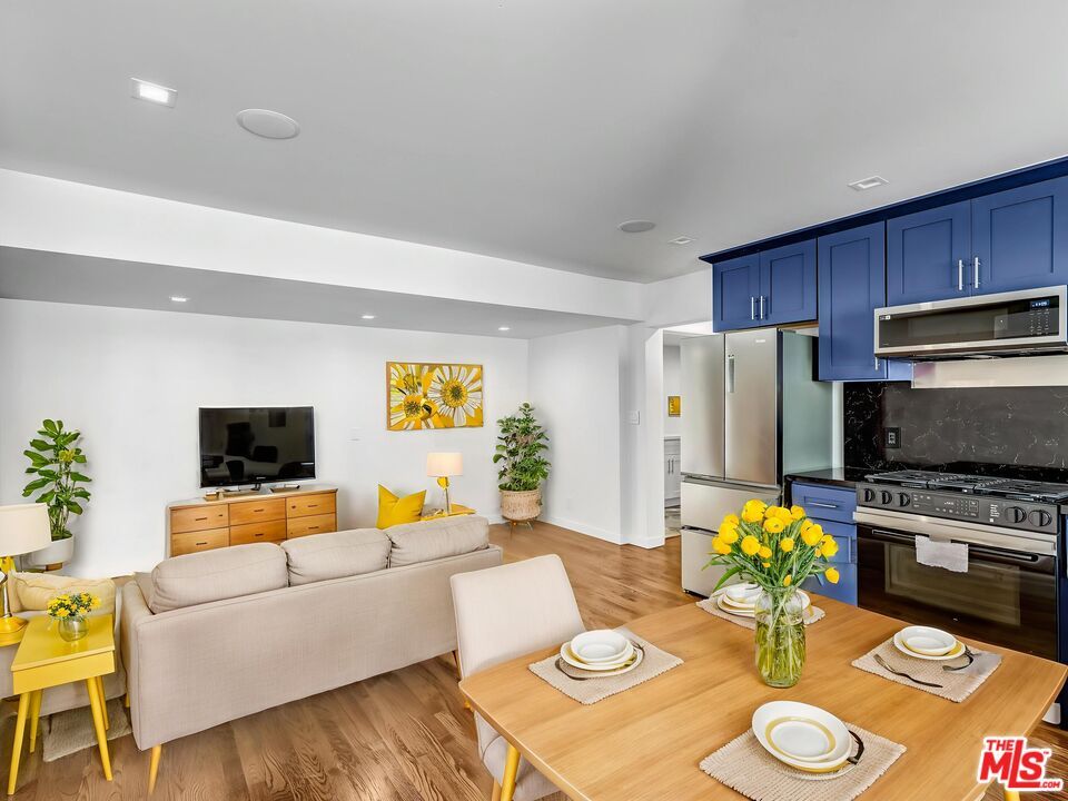 Dining room, Interior, Kitchen, Living room, Recessed Lighting, Stainless Steel Appliances, Wood Texture Flooring
