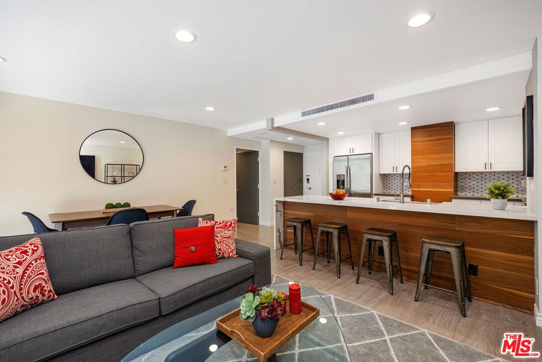 Dining room, Interior, Kitchen, Living room, Recessed Lighting, Stainless Steel Appliances, Wood Texture Flooring