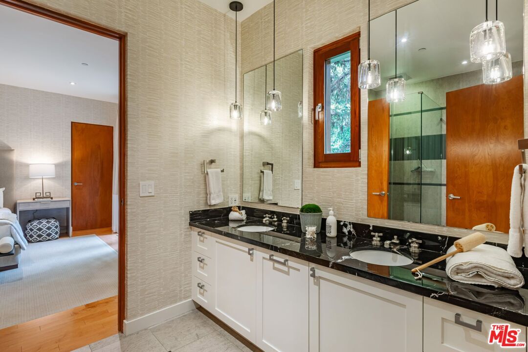 Bathroom, Dual Sink Vanities, Interior, Pendant Lights, Recessed Lighting, Wood Texture Flooring