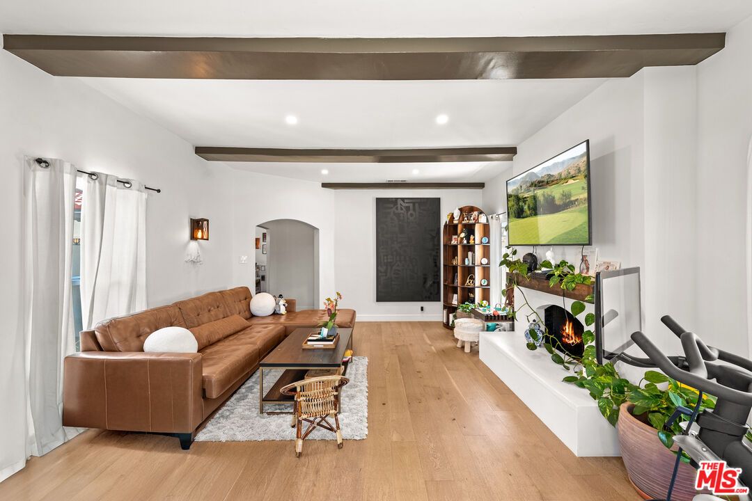Fireplace, Interior, Living room, Recessed Lighting, Wooden Beams, Wood Texture Flooring