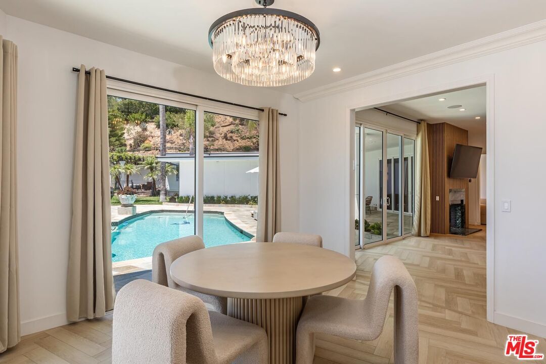 Chandelier, Dining room, Interior, Pool, Recessed Lighting, Wood Texture Flooring