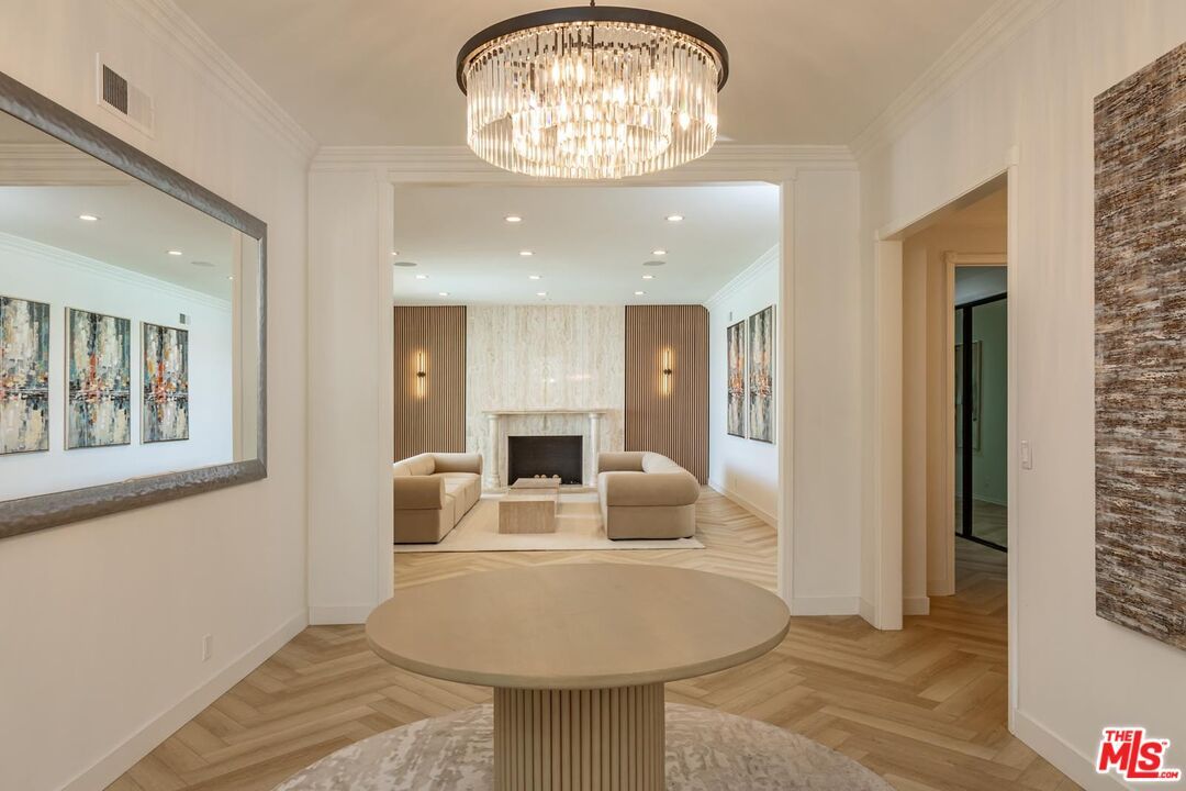 Chandelier, Fireplace, Interior, Living room, Recessed Lighting, Wood Texture Flooring