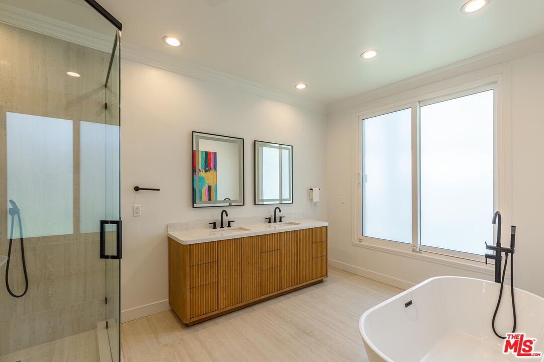 Bathroom, Dual Sink Vanities, Free Standing Baths, Glass Shower, Interior, Recessed Lighting, Wood Texture Flooring