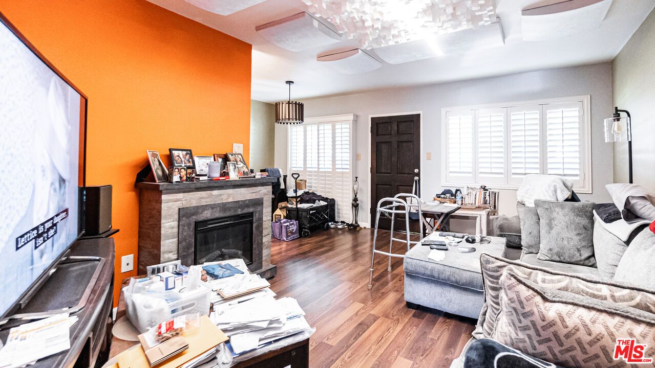 Dining room, Fireplace, Interior, Living room, Pendant Lights, Wood Texture Flooring
