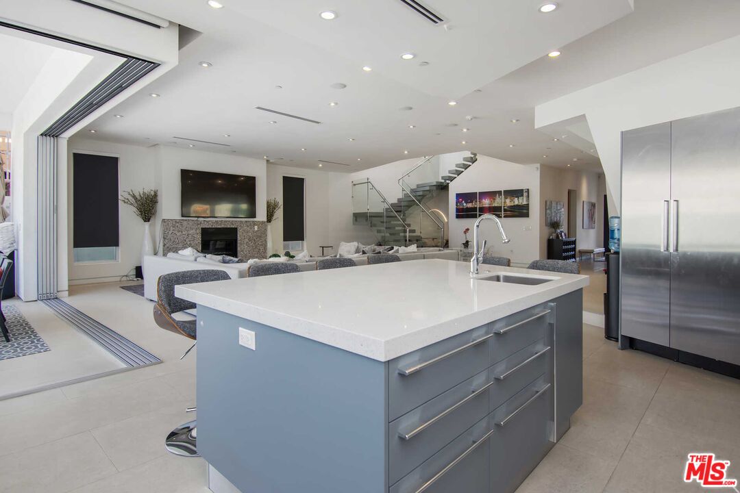 Fireplace, Interior, Kitchen, Living room, Recessed Lighting, Stainless Steel Appliances