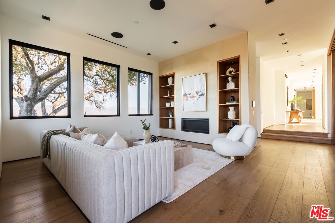 Fireplace, Interior, Living room, Recessed Lighting, Wood Texture Flooring