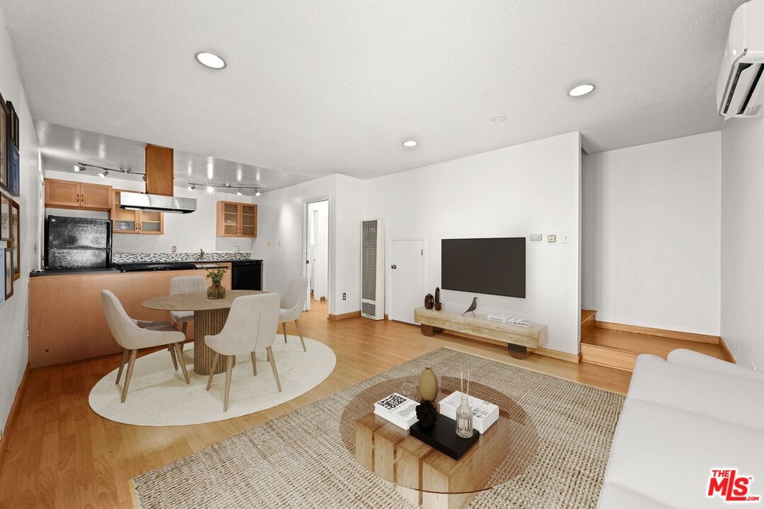 Dining room, Interior, Kitchen, Living room, Recessed Lighting, Stainless Steel Appliances, Wood Texture Flooring