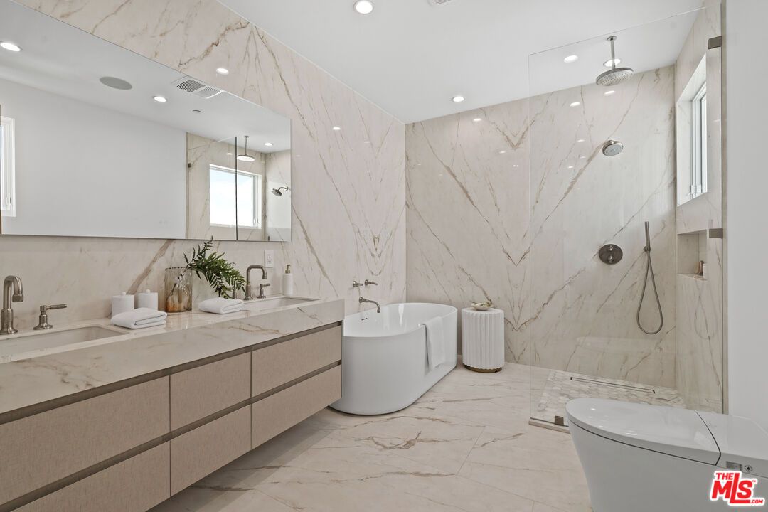 Bathroom, Dual Sink Vanities, Free Standing Baths, Glass Shower, Interior, Marble, Marble Walls, Recessed Lighting