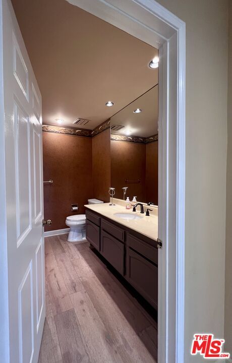 Bathroom, Dual Sink Vanities, Interior, Recessed Lighting, Wood Texture Flooring
