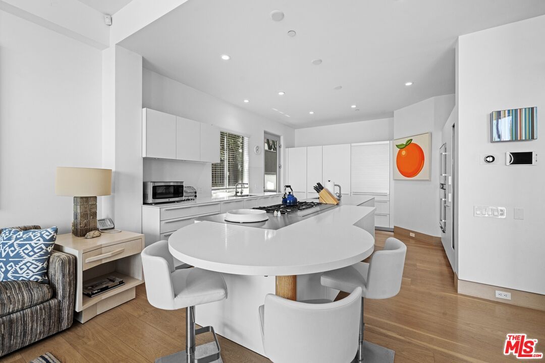 Dining room, Interior, Kitchen, Recessed Lighting, Stainless Steel Appliances, Wood Texture Flooring
