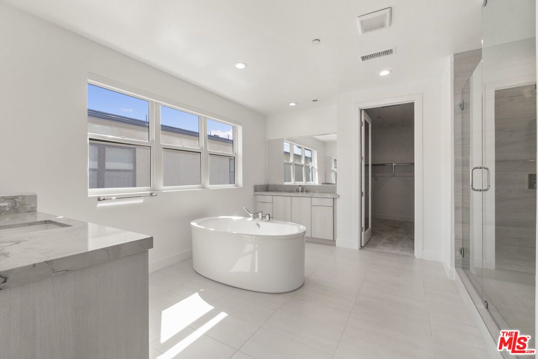 Bathroom, Dual Sink Vanities, Free Standing Baths, Glass Shower, Interior, Recessed Lighting