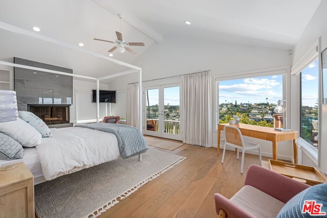 Bedroom, Fireplace, Interior, Recessed Lighting, Water, Wood Texture Flooring
