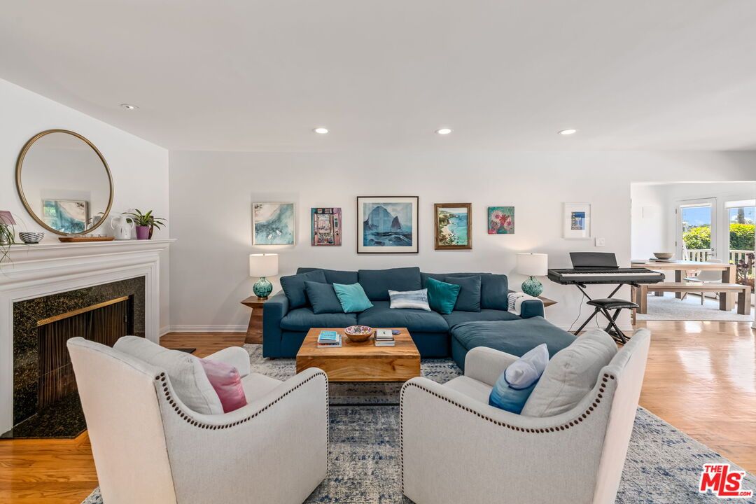 Fireplace, Interior, Living room, Piano, Recessed Lighting, Wood Texture Flooring