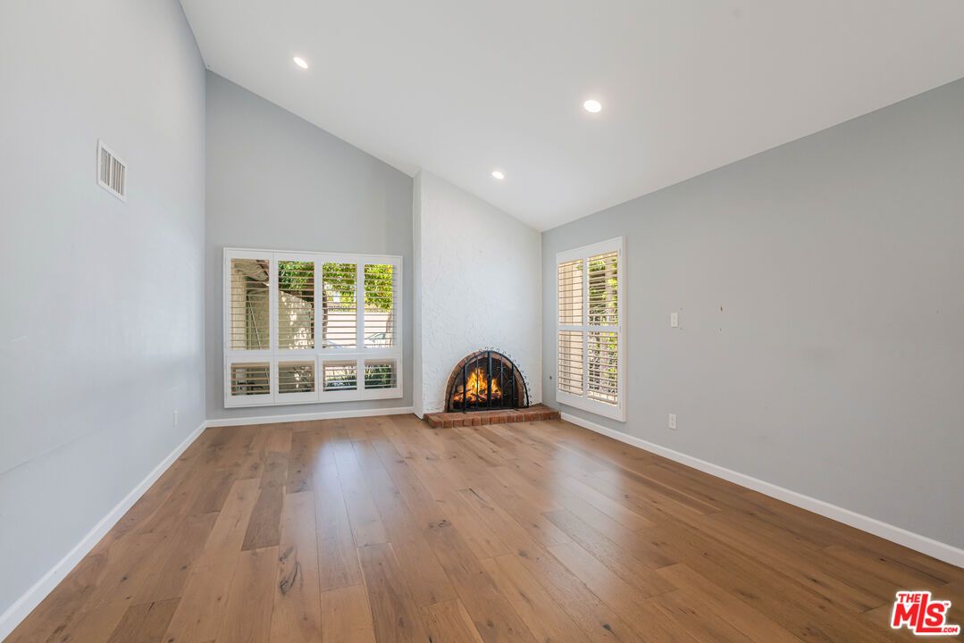 Empty room, Fireplace, Interior, Recessed Lighting, Wood Texture Flooring