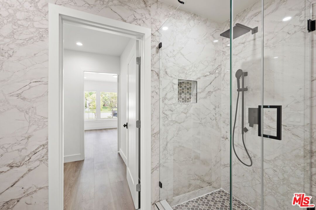 Bathroom, Glass Shower, Interior, Marble Walls, Recessed Lighting, Wood Texture Flooring