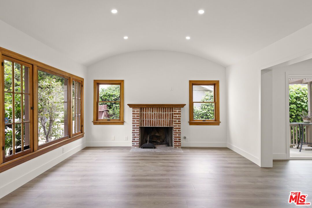 Empty room, Fireplace, Interior, Recessed Lighting, Wood Texture Flooring